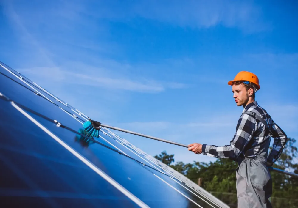 man-worker-firld-by-solar-panels